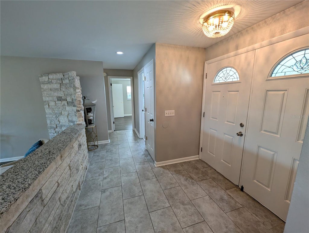 Photo of 3273 Harbor Lake Drive, Largo, FL 33770 (MLS # TB8535381)