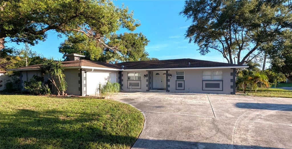 Photo of 3273 Harbor Lake Drive, Largo, FL 33770 (MLS # TB8535381)