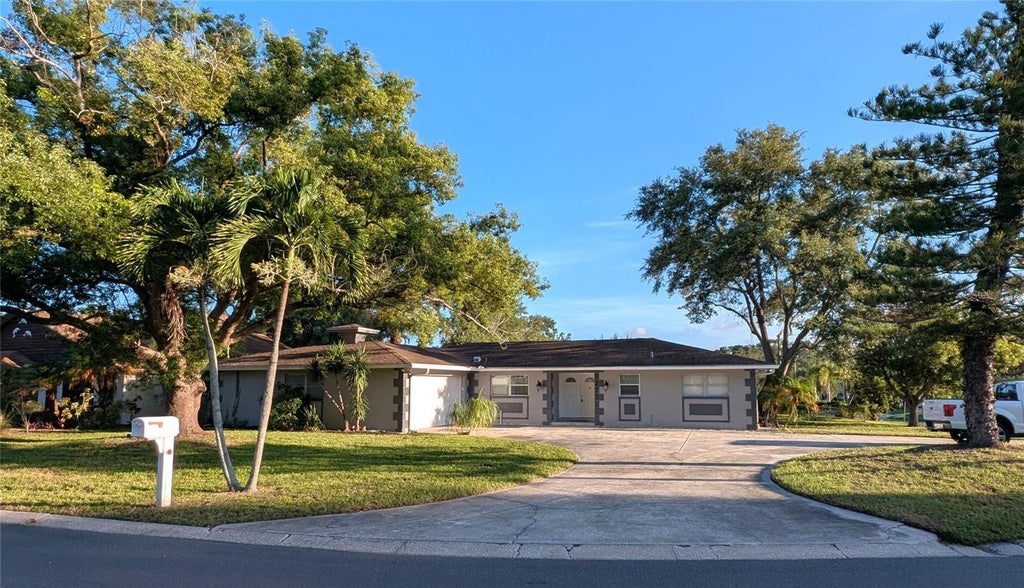 Photo of 3273 Harbor Lake Drive, Largo, FL 33770 (MLS # TB8535381)