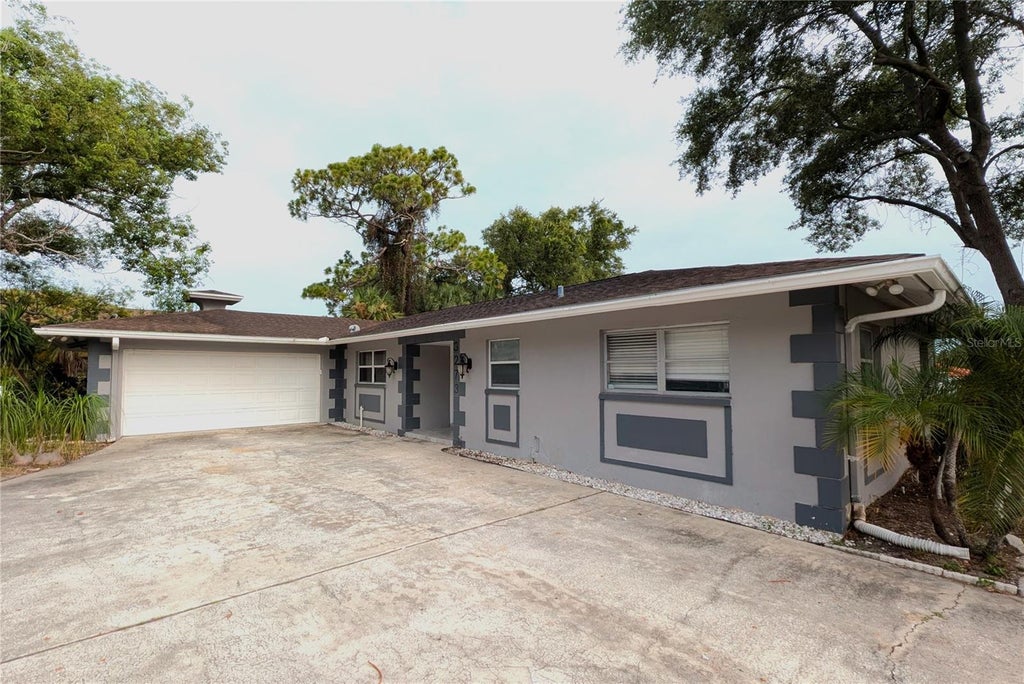 Photo of 3273 Harbor Lake Drive, Largo, FL 33770 (MLS # TB8535381)