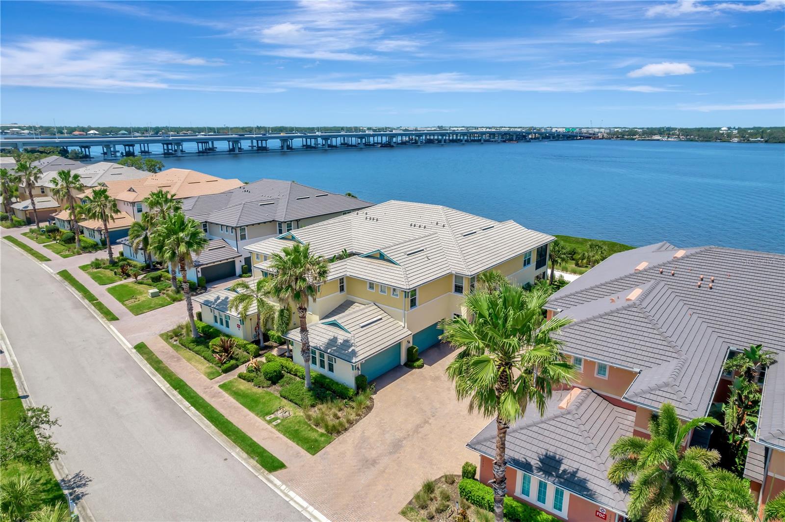 Imagine where every day at home feels like being at a resort. The Tidewater Preserve community will offer you just that. Whatever season of life, your family will enjoy unmatched access to impressive amenities such as three pools, one, a lap pool with a beach entry feature, Har-Tru tennis courts, 2 fitness centers, a playground, dog park, kayak launch and a riverfront walking trail with observation point. If boating is your passion, this unit offers easy access to the marina where first come, first served, boat slips are currently available for rent.
Two clubhouse properties, The Lodge, or the Port and Court, can be reserved by residents for private gatherings. A monthly calendar outlines residents access to group fitness classes, arts & crafts, book clubs, Mahjong, card games, and family-friendly holiday parties. The community also hosts various concerts, car show, food trucks and plentiful opportunities for recreation, relaxation, and social activity. Community boaters provide a holiday boat parade, a pirate themed event and regularly form a flotilla of boats up the Manatee River to waterfront restaurants or Gulf-side beaches. The Manatee River has quick and easy access to Tampa Bay, the Gulf of America and fishing near the Sunshine Skyway.
This Carriage Home offers water views from every window. The sliding glass doors across the rear of the unit open to the Manatee River. Step on to the screened lanai, look to your right for radiant sunrises or your left for magnificent sunsets. During holidays, enjoy a front row seat to various municipalities’ firework displays all up and down the river. Through the front bedroom windows, you can keep watch on the comings and goings at the marina or neighborhood lagoon.
Enjoy a spacious, light, and bright kitchen with granite countertops, soft-close wood cabinets, Whirlpool appliances, under and over cabinet lighting and a walk-in pantry. The open-concept dining and great room layout lends itself to easy entertaining. There is also space for a breakfast nook or desk with lovely water views.
The newly carpeted primary retreat has two closets, one a spacious walk-in, and an ensuite bathroom with a private water closet, dual sinks, stone countertops, and a glassed-in shower.
A split-planned unit, the second and third bedrooms have new luxury vinyl flooring, ceiling fans and spacious closets. The hall bath has a tub and stone counter tops. The inside laundry room provides extra storage opportunities and a utility sink. The two-car garage has a motorized door opener and electronic keypad access.
A volunteer network of community members ensures a well-run HOA with ample reserves to preserve your right to the quiet enjoyment of your property. With storm-rated windows and doors, including a wind brace for the garage door, you will enjoy the safety and security of this gated community. Since built nine years ago, this unit has weathered three hurricanes without water intrusion or wind damage.
Few properties in the Manasota area offer so much, on the waterfront, with boating access for the price. Start the next season of your life today! Call today and schedule a showing. Realtor is owner. Price adjustment due to updated appraisal.