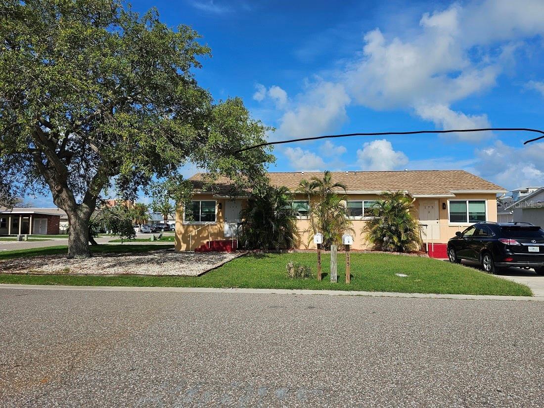 ELEVATED DUPLEX WITH HURRICANE WINDOWS and A NEW ROOF. ONE BLOCK TO THE GEORGEOUS SUNNY BEACHES AND GULF WATERS WITH FABLOUS RESTAURANTS AND BARS ALONG THE WAY. PET FRIEDLY. This large 2 bedroom and 1 bath unit comes equipped with your own Private and Inside Full-size Washer and Dryer. This unit has an Open Floor plan with an EXTREMELY large kitchen / Living room / Dining Room. Great for entertaining!! New Granite Countertops over New Wood Soft Close Cabinets. All Stainless-Steel Kitchen appliances, Refrigerator, Dishwasher, Stove/Oven, Kitchen sink and restaurant style Faucet. Freshly painted with Tile Flooring throughout the entire unit with new baseboards. The Bedrooms are a split plan with bath in-between. Central AC and electric Hot water heater. There is an oversized parking pad with plenty of parking. Tenants pay for electric and cable. Landlord pays for outside yard care, water, sewer, trash and outside pest control. Redington Shores has underground Utilities so no unsightly overhead wires hanging everywhere. Available now. PET FRIENDLY, SOME RESTRICTIONS APPLY. A tenant check is mandatory for each qualifying tenant. Non-Smoking property. Tenants please verify room dimensions.