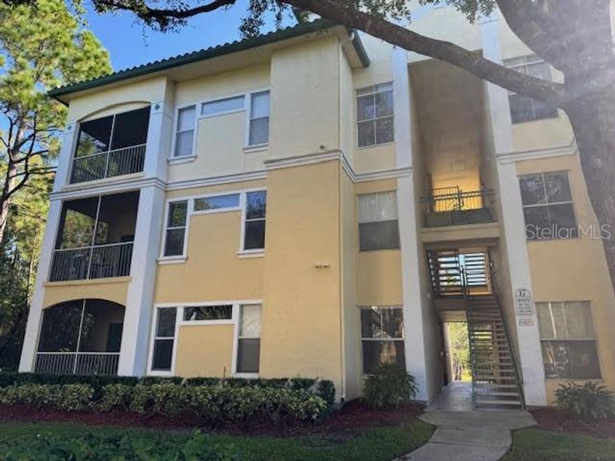 Hard to find corner unit that is next to trees and woods. This unit includes TWO covered parking places in front of unit and WATER, FIBER OPTIC WIFI, VALET TRASH and WASHER/DRYER INCLUDED! This well maintained, third floor, 2 bed 2 bath unfurnished condo is only 6 miles to Disney and 4 miles to H2O water park. The community is near all types of restaurants, grocery stores and shopping centers. Grab your towel and relax at one of the two pools or relax on your covered, screened in patio, complete with a storage closet. Laminate floors in living room and carpet in bedrooms; tile in the kitchen, dining area and both baths. An energy efficient AC system along with ceiling fans in the living room and both bedrooms, are sure to keep you comfortable and cool during the hot summer days. This 50-acre fabulously landscaped community also has MORE AMENITIES than most communities do!! There's a sand volleyball court, 2 pools (one with a splash pad and a lagoon-style walk-in entrance), an upgraded fitness center, BBQ areas, volleyball, pickle ball/basketball courts, a golf cage, a tennis court, and a large, gated playground. This gated community has a nature walking path, two lakes and a pond with fountains, & well established oak, pine and maple trees giving it a restful park-like appearance. The clubhouse has a game room and conference room, and a bright enclosed air conditioned sunroom for indoor relaxation overlooking the main pool. Minimum requirements are a 640+ credit score, a verifiable net income of 2 1/2 times the rent rate , 1st months rent ($1550) plus security deposit of $500. due on lease signing. No smoking, no subletting to any AirBnB, VRBO, short term rental or like business. Resort-style living at Legacy Dunes will make you feel like you're on vacation every day! Unit was staged for the pictures in this unit. It is UNFURNIHISED.
