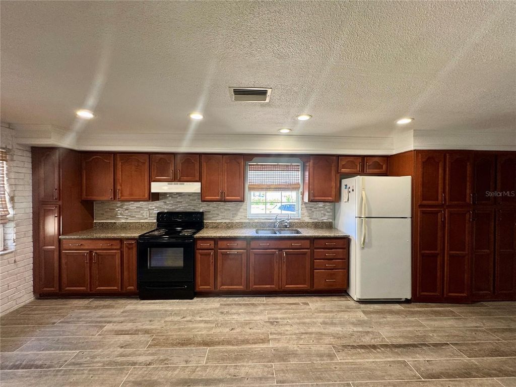 Photo of 695 Mandalay Avenue, Clearwater Beach, FL 33767 (MLS # TB8409927)