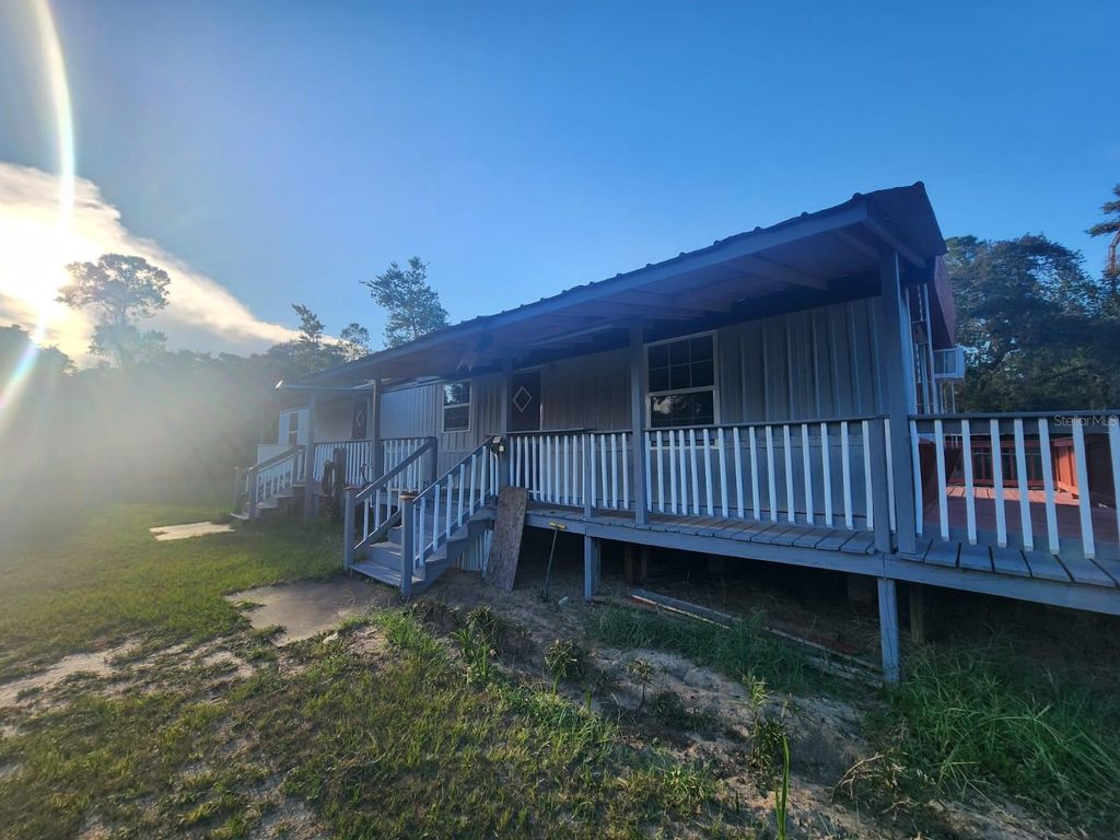 Photo of 17155 SW 17th Circle, Ocala, FL 34473 (MLS # OM718903)