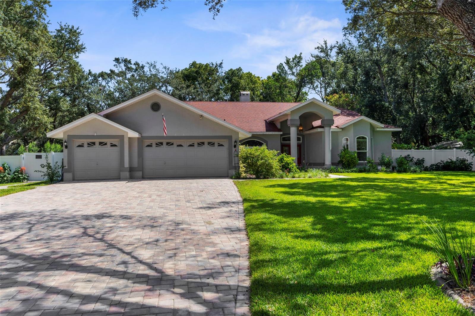 One or more photo(s) has been virtually staged. Welcome to 14025 Warm Springs Ct, A Stunning Custom Home Located in the Highly Desired Autumn Oaks Neighborhood. Set on a Sprawling 0.57 Acre Lot Adorned with Towering Oak Trees, this Property Offers the Perfect Blend of Privacy, Character, and Comfort. Boasting 2,614 SqFt of Living Space and 3,960 SqFt Under Roof, this 3 Bedroom, 2 Bathroom Home Features a Spacious and Thoughtfully Designed Floor Plan with Room for Both Relaxation and Entertaining.
Enjoy Peace of Mind with a New Roof Installed- 2016, Updated Air Conditioner- 2017, New Double Pane Windows And Doors Added In 2020. Repaired Ground Settlement- 2025. The Freshly Painted Interior Shines With Natural Light And Welcomes You With Warmth And Style. Step Outside To Your Own Private Oasis—Complete With A Sparkling Pool with a Water Feature, Fenced Backard Oasis, An Irrigation Well To Keep The Grounds Lush, and Pavered Driveway and Patio Deck Ideal For Gatherings Or Quiet Evenings Outdoors.
The Oversized 3 Car Garage Offers Ample Space for Vehicles, Tools, and Toys. Located in A Quiet, Tree-Lined Community Of Custom Homes, 14025 Warm Springs Ct Is A True Gem That Combines Modern Comfort with Timeless Beauty. Don’t Miss The Chance To Call This Incredible Property Home.