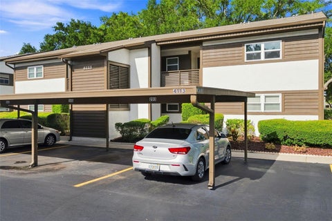 Photo of 4113 Passport Lane #102, New Port Richey, FL 34653 (MLS # W7889242)