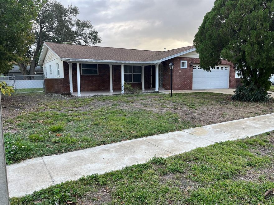 Live in the wonderful city of Seminole, FL for under 350K!  Great 3 bedroom, 2 full bathrooms, and 2 car garage.  Zoned for the wonderful schools in the area.  NO HOA and NO CDD Fees!   New AC, fridge, and gas range.  Both range and water are fueled by gas to to save money on electric bills.   Fenced in backyard and that is great for pets.   Tiled floors is great for wonderful pets.  Enjoy FL evenings on the screened in back porch.  Backyard boasts of tropical fruit such as star fruit and dragon fruit. Garage floor is newly painted.  Front loaded washer and dryer come with the property!  Move in ready or remodel to your tastes.