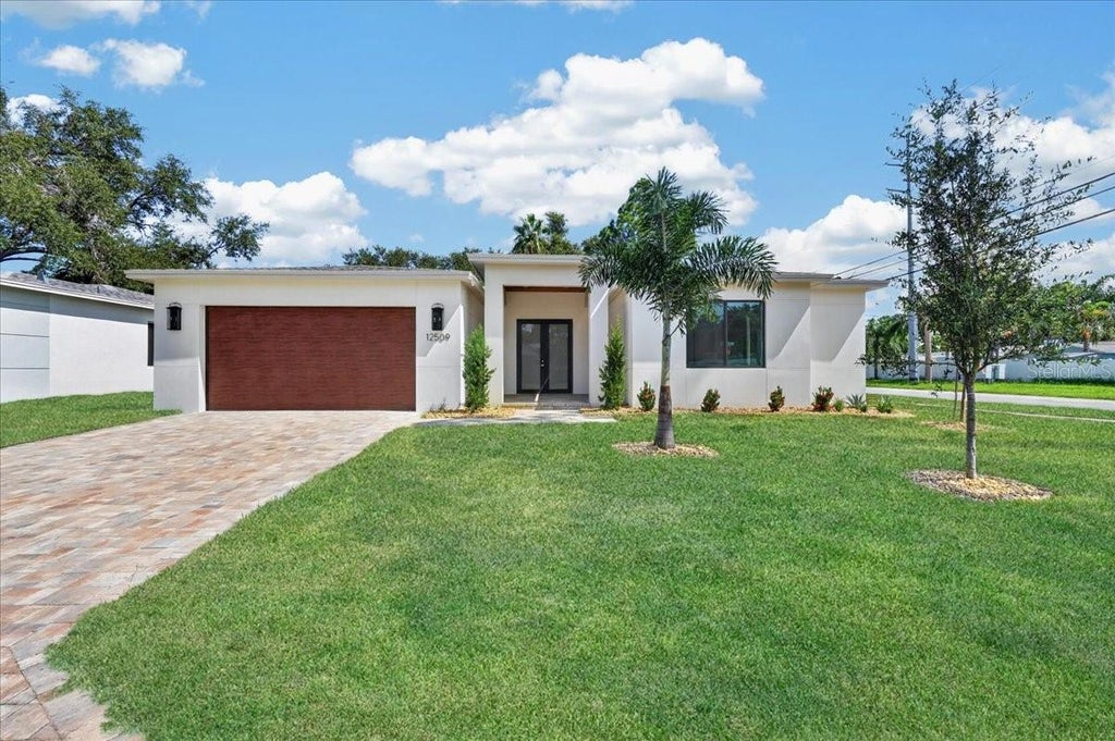Photo of 12509 83rd Avenue, Seminole, FL 33776 (MLS # L4964476)