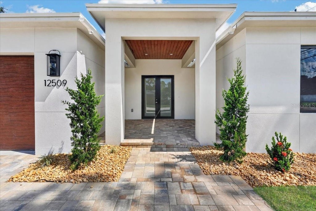 Photo of 12509 83rd Avenue, Seminole, FL 33776 (MLS # L4964476)