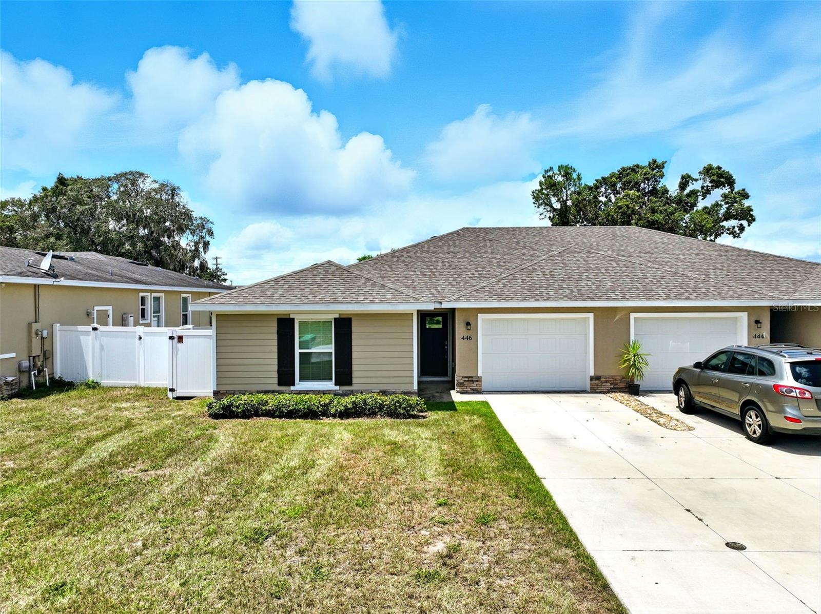 Modern 3-Bedroom 1/2 Duplex for Rent in Eustis This beautifully designed 1/2 duplex offers 3 spacious bedrooms, 2 bathrooms, and an open floor plan perfect for modern living. Enjoy the style of wood-look tile flooring throughout the home. The kitchen features stainless steel appliances, sleek quartz countertops, and plenty of storage space. The laundry area is conveniently located in a dedicated closet situated between the second and third bedrooms. The primary bedroom includes a walk-in closet, adding convenience and functionality. Step outside to a large backyard, perfect for relaxing or entertaining, and enjoy the added bonus of a 1-car garage. Schedule your tour today and make this incredible rental yours!