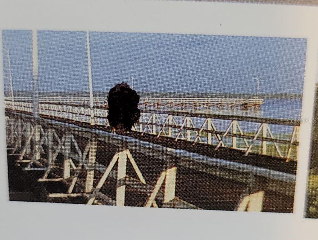 Photo of 906 Valencia Drive, Indian Lake Estates, FL 33855 (MLS # O6000094)