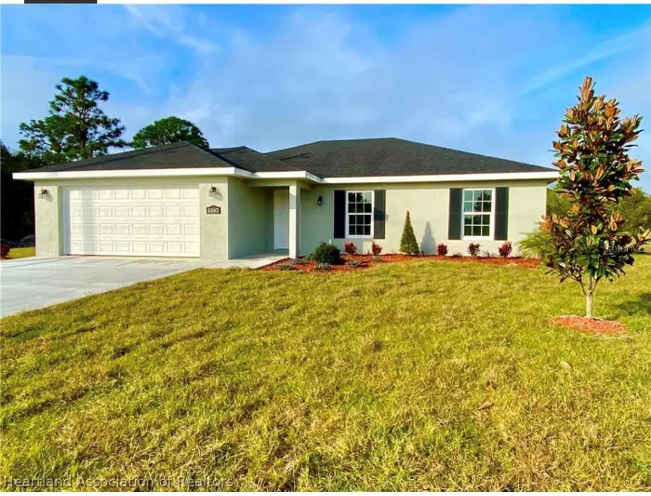 Barely lived in 3 bedroom 2 bath home. The lovely home has many upgrades including 36" white shaker cabinets with soft close doors and drawers, granite counter tops, stainless steel appliances, tile floor in kitchen and bathrooms, luxury vinyl planking in the remainder of the house. There are ceiling fans in the bedrooms and living room. The home is equipped with irrigation system. Sun n Lakes is a golf cart community with a 36 hole championship golf course, pickleball, tennis courts, swimming pool, community center, fishing lake, biking trails, 24 hour security, restaurant plus the elementary and middle school are there also. Close to the hospitals and grocery stores. Come see this lovely home.