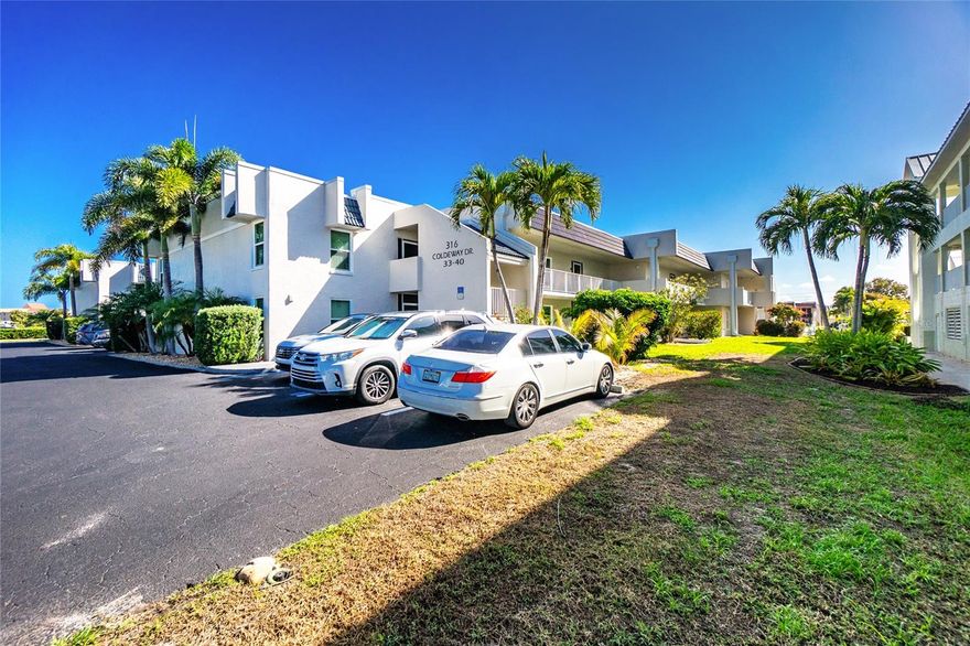 Impressive condo with DEEDED DOCK and 8000 lb BOAT LIFT!! This 2 Bedroom, 2 Bathroom second floor condo is located in Coldway Commons in desirable deed restricted PUNTA GORDA ISLES. This light and bright condo offers an open and split bedroom floor plan with Great Room, well equipped Kitchen, Inside Laundry and rear 19x10 Porch. Beautiful design features throughout. The spacious Great Room has sliding glass doors to the screened Porch and opens to the Dining Area and Kitchen. The Kitchen features white cabinets, granite counters, tile backsplash, breakfast bar that seats four and stainless appliances. Appliances include French door refrigerator, oven/range, dishwasher built in microwave. The laundry offers a washer, dryer and cabinets. The Master Bedroom suite has porch access via sliding glass doors, great closet space and private bathroom with large walk in shower, his and hers sinks with granite counters. The second bedroom is generous sized with great closet space and the guest bathroom has a tub/shower combination. The community has an inground heated pool and Coldway Commons is minutes from the Visual Art Center, Fishermen's Village and historic downtown Punta Gorda shopping, dining, waterfront parks , walking and biking paths, boat ramps, art galleries, weekend farmer and artisan markets, Charlotte Harobr Event Center, weekend events and more.