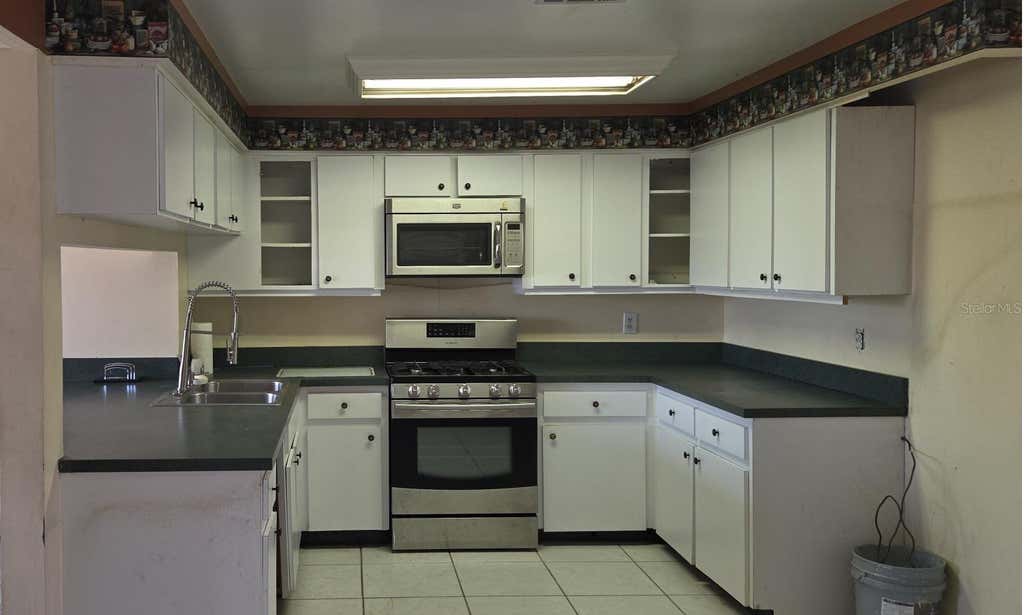 Photo of 8665 Mockingbird Lane, Seminole, FL 33777 (MLS # U8251731)