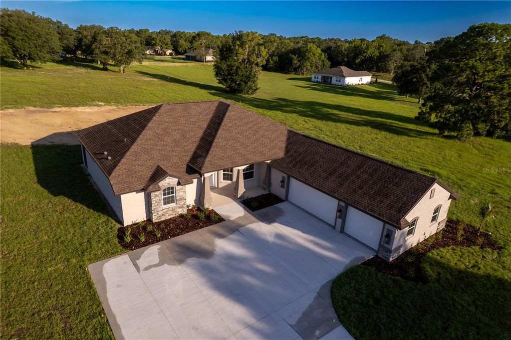 Photo of 636 N Cherry Pop Drive, Inverness, FL 34453 (MLS # TB8411360)