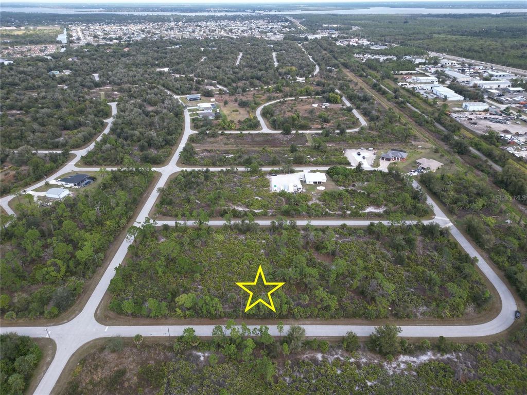 Photo of 13250 Rouding Circle, Port Charlotte, FL 33981 (MLS # D6145573)