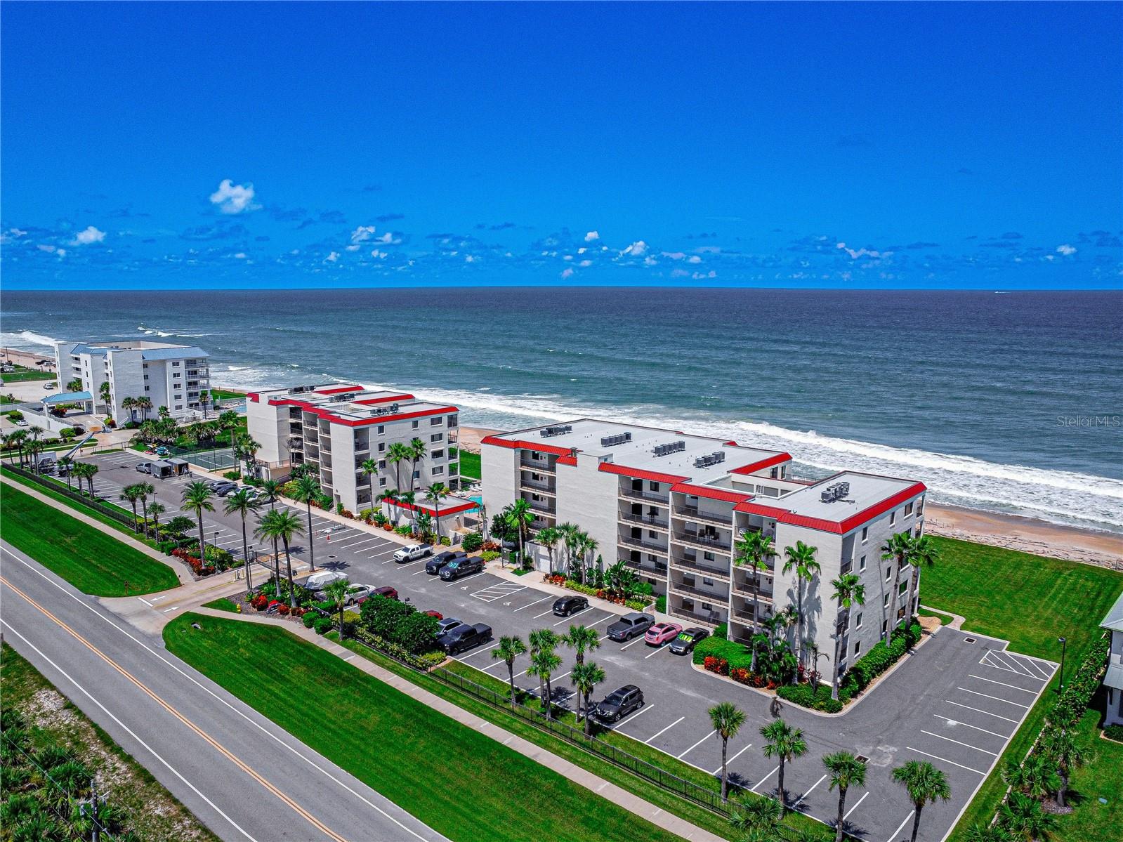 AMAZING VIEWS!! Enjoy the best of coastal living in this beautifully renovated oceanfront condo located in the highly desirable no-drive section of New Smyrna Beach. Floor-to-ceiling windows in the living room and primary bedroom showcase sweeping views of the Atlantic Ocean, creating a light-filled and inviting space.
Recent updates include new bathrooms with glass shower doors, a refreshed kitchen with tile backsplash and new refrigerator, new tile flooring, updated light fixtures, and a new A/C system. The condo also features updated furniture, bedding, and décor, making it ready to enjoy from day one.
Chadham by the Sea offers a prime location between the Atlantic Ocean and the Indian River, providing stunning sunrises and sunsets. Community amenities include a gated entrance, oceanfront pool, and easy access to Mary McLeod Bethune Beach Park just across the street, where you can launch a kayak, fish from the pier, play volleyball, or enjoy the playground.
This property combines modern updates with a true beachside lifestyle in one of New Smyrna’s most sought-after locations