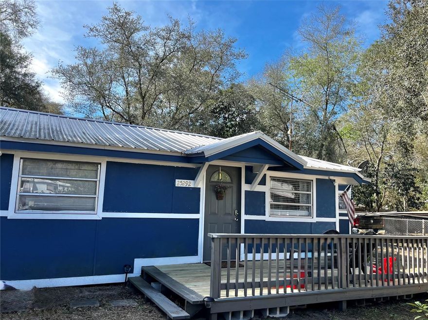 This 3-bedroom, 1-bath wood-frame home offers a great chance to settle in or invest without breaking the bank. Fresh exterior paint and a new well pump system have already been taken care of, and the rest is ready for your personal touch. The fully fenced yard offers privacy and peace of mind, while a cozy patio nook out back is perfect for relaxing with your morning coffee or winding down after a day on the water. Located just across Hwy 19 from Salt Springs Marina and the spring head, outdoor activities like boating, fishing, and swimming are practically at your doorstep — but you're not far from the city, either. Easily accessible from Ocala, Gainesville, and Palatka, this spot makes a great full-time residence, weekend retreat, or short-term rental opportunity. Enjoy the nearby conveniences like local dining, groceries, and trailheads, or just enjoy the space and simplicity of small-town life. Whether you’re looking to escape, invest, or just slow things down a little — this property is DEFINITELY worth a look.