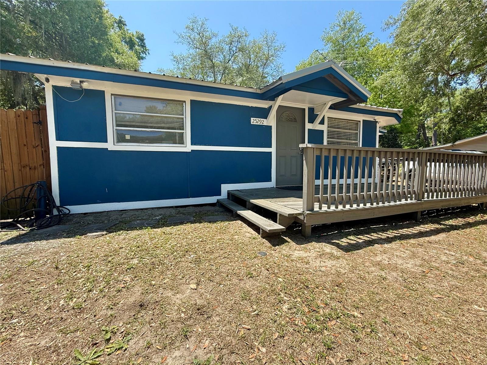 Welcome to Salt Springs — a laid-back Florida hideaway where life moves a little slower and the weekends can last forever. This 3-bedroom, 1-bath wood-frame home offers a great chance to settle in or invest without breaking the bank. Fresh exterior paint and a new well pump system have already been taken care of, and the rest is ready for your personal touch. The fully fenced yard offers privacy and peace of mind, while a cozy patio nook out back is perfect for relaxing with your morning coffee or winding down after a day on the water. Located just across Hwy 19 from Salt Springs Marina and the spring head, outdoor activities like boating, fishing, and swimming are practically at your doorstep — but you're not far from the city, either. Easily accessible from Ocala, Gainesville, and Palatka, this spot makes a great full-time residence, weekend retreat, or short-term rental opportunity. Enjoy the nearby conveniences like local dining, groceries, and trailheads, or just enjoy the space and simplicity of small-town life. Whether you’re looking to escape, invest, or just slow things down a little — this property is worth a look. Schedule your showing and see the potential for yourself!