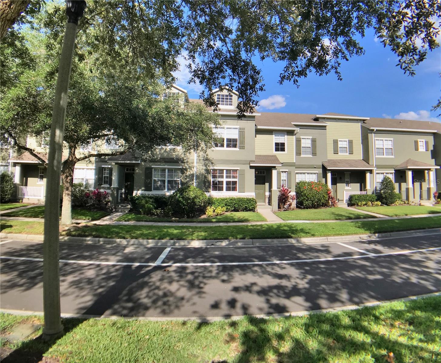 Ready for move in immediately! This lovely townhouse features 1,778 sq. ft., 3 bedrooms and 2.5 bathrooms and is located in the quiet community of Beacon Park. This home is well maintained and includes a large and open floor plan, unique archways, and lots of natural light. Enjoy the neutral paint throughout, carpeting, ceiling fans, extensive use of tile flooring! The eat-in kitchen offers 42" cherry cabinets, lots of storage, large pantry, and breakfast bar, upgraded stainless steel appliances, recessed lighting and is very large, bright and open. Downstairs you will also find 10ft. ceilings, formal dining room, flex room, and a living room open to the kitchen. The master suite is generous and includes a large walk-in closet as well as a nicely appointed bathroom that includes dual sinks, walk-in shower, and inviting roman tub. The laundry room is located upstairs for added convenience. You will love to relax in your private paver styled courtyard! The courtyard connects to a rear entry 2-car garage with additional driveway parking. The community amenities include a pool and a playground. Conveniently located near of OIA, Lake Nona, attractions, Hunter's Creek, The Loop, and the newly constructed Medical City in Lake Nona! Easy access to Hwy 417 & 528. All applicants are required to do a credit and background check. Renters insurance is required. **2 pets 40lbs max**