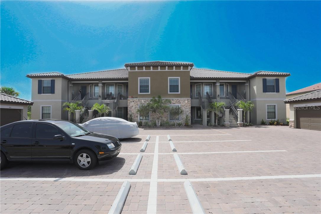2 Bedroom 2 Bath Condo with Den and Detached One Car Garage in the sought after community of Esplanade at Lakewood Ranch! This first floor unit offers granite counters, stainless appliances, eat in kitchen, breakfast bar, formal dining for 6, a great room/kitchen combo with beautiful views of the golf course. Split bedroom plan with on suite guest bedroom area. Master suite offers a King Bed, a walk in closet, his and her sinks in master bath and walk in shower. Guest bedroom offers queen bed. Enjoy resort style living with Golf, Culinary Center, Lagoon style pool, full service Tiki Bar, State of the Art Fitness Center with classes, Day Spa, Tennis Courts, Bocce Ball, Pickle Ball and much more! Owners Membership transfers for just $600. Small Dog Ok with Pet Fee. BOOKED FEBRUARY AND MARCH 2026. AVAILABLE DECEMBER 2025 JANUARY 2026 $7000 MONTH