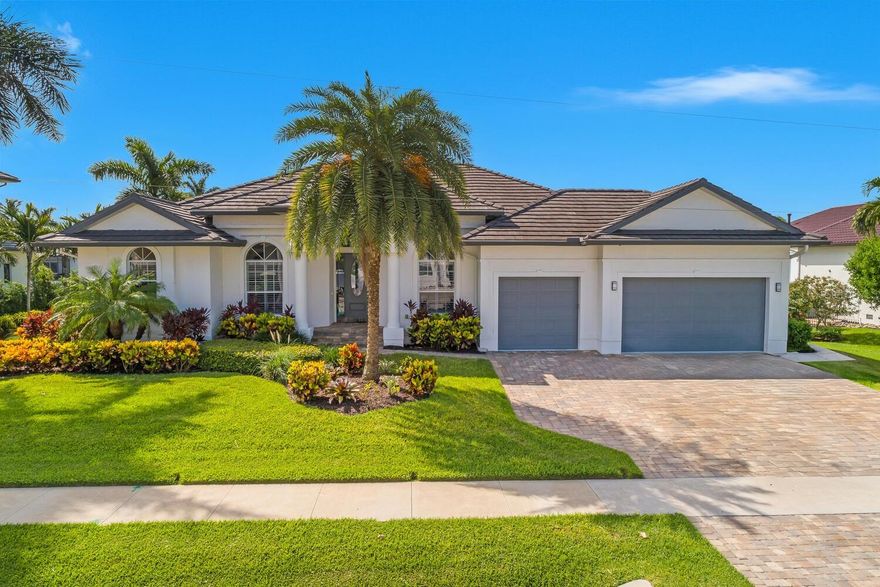 "UNIQUE OPPORTUNITY" This is more than just a home, it's an invitation to experience the ultimate island lifestyle in a thriving, upscale neighborhood. This water front home located on an oversized lot in the impressive Tigertail neighborhood on Marco Island is deep water direct that allows for a larger vessel. Where you can walk, bike or boat to one of our fine shops and restaurants. This elegant home offers a neutral pallet with 3 bedroom 2 baths including an office. Enjoy spacious open split floor plan with high ceilings, large rooms including a family room, sitting room, dining room, breakfast nook, large stone island, fully equipped kitchen, and bahama shutters. The primary suite offers tray ceilings, large stone shower, two closets and two vanities. The back of the house is a wall of windows that overlook the salt water lap pool with panoramic screen. The spacious pool deck is ready for entertaining with a firepit table, sectional and dining table. You can lounge on the deck below alongside the dock with two boat slips. Very well maintained property. The flat tile roof and stylish pavers adorn the driveway that take you to the large garage with ample storage, high ceilings, 3 bays with an epoxy floor. Professionally decorated, lush landscape, hurricane roll downs, generator on a transfer switch, security system and offered turn key. A fantastic opportunity! A ready made island lifestyle in a neighborhood with new elegant modern estate homes. Marco Island is an active lifestyle. Famous for our crescent beach with sugar sand, easy boating, great golf, tennis, cuisine from around the world and the best sunsets on the planet. This truly is the "ULTIMATE PACKAGE".