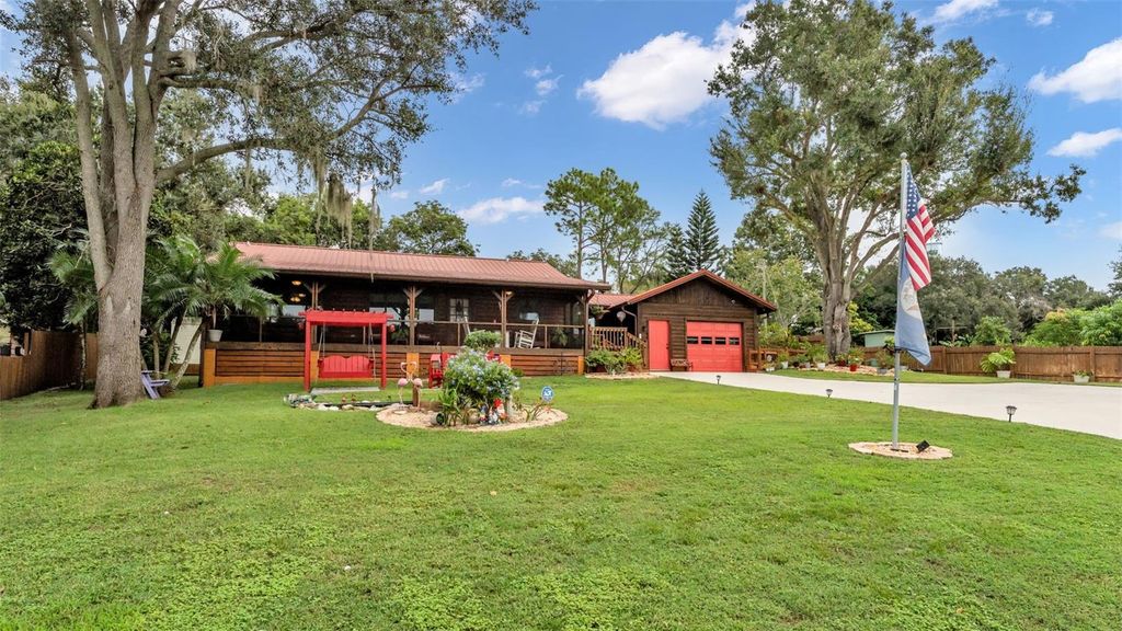 Photo of 219 E Lake Menzies Boulevard, Dundee, FL 33838 (MLS # L4956546)