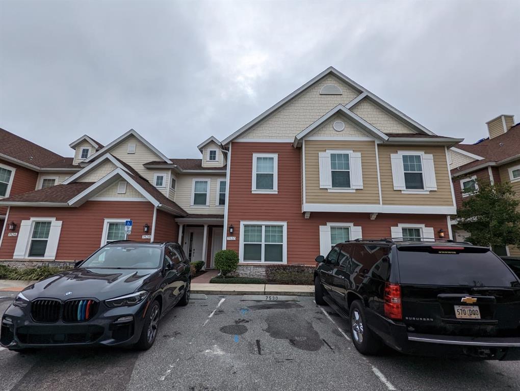 This luxury townhome boasts four bedrooms, all with individual bathrooms plus a 1/2 bath. Many upgrades, such as granite countertops and premium carpeting. The home is beautifully decorated and is sold furnished. Save on costs using tankless water heaters and natural gas appliances. Private patio with private conservation views. Luxury finishes and an open floor plan are designed to complement today's contemporary lifestyles. Summerville resort has a fantastic location just minutes from shops, Theme Parks, and restaurants. Zoned for short-term rentals. In good condition, currently rented with several bookings for short-term rental.