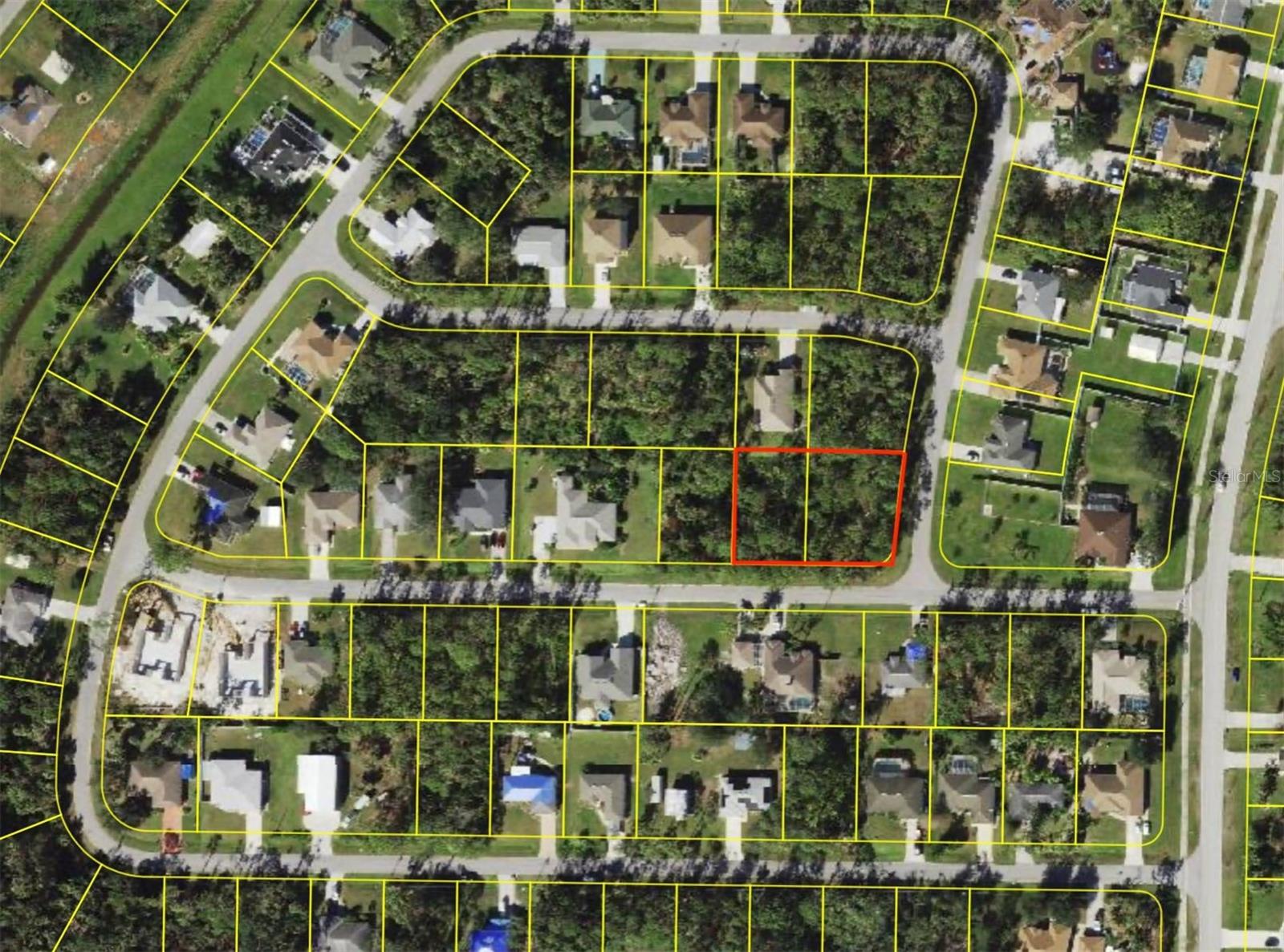 DOUBLE LOT! Build your dream home on these spacious double lots in the fast-growing city of North Port. Conveniently located near I-75 and Tamiami Trail, this property offers easy access to major routes while maintaining a peaceful atmosphere in a quiet neighborhood. Enjoy the convenience of nearby shopping centers, a new Costco, and Wellen Park making every day errands a breeze. Don't miss out on this prime location - ideal for investment or personal use.