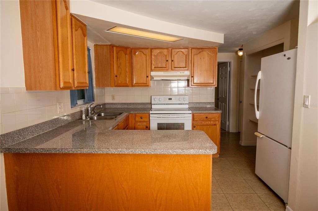 Photo of 1203 Brightwell Drive, Holiday, FL 34690 (MLS # W7885349)