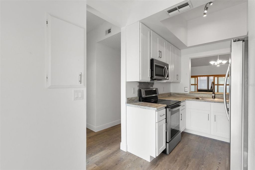 Photo of 14773 Feather Cove Road, Clearwater, FL 33762 (MLS # TB8427793)