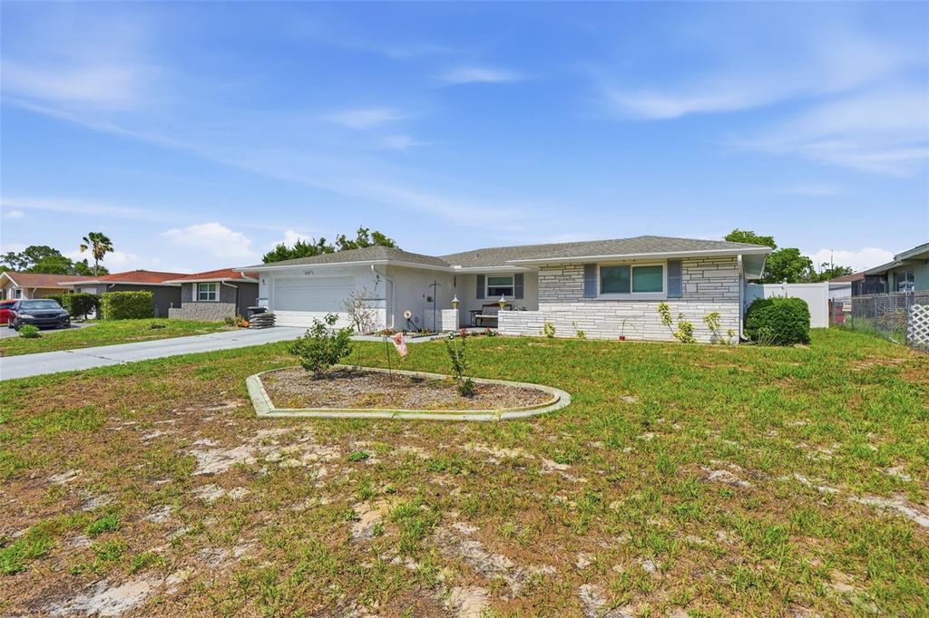 Photo of 10339 Amadeus Drive, Port Richey, FL 34668 (MLS # TB8511563)