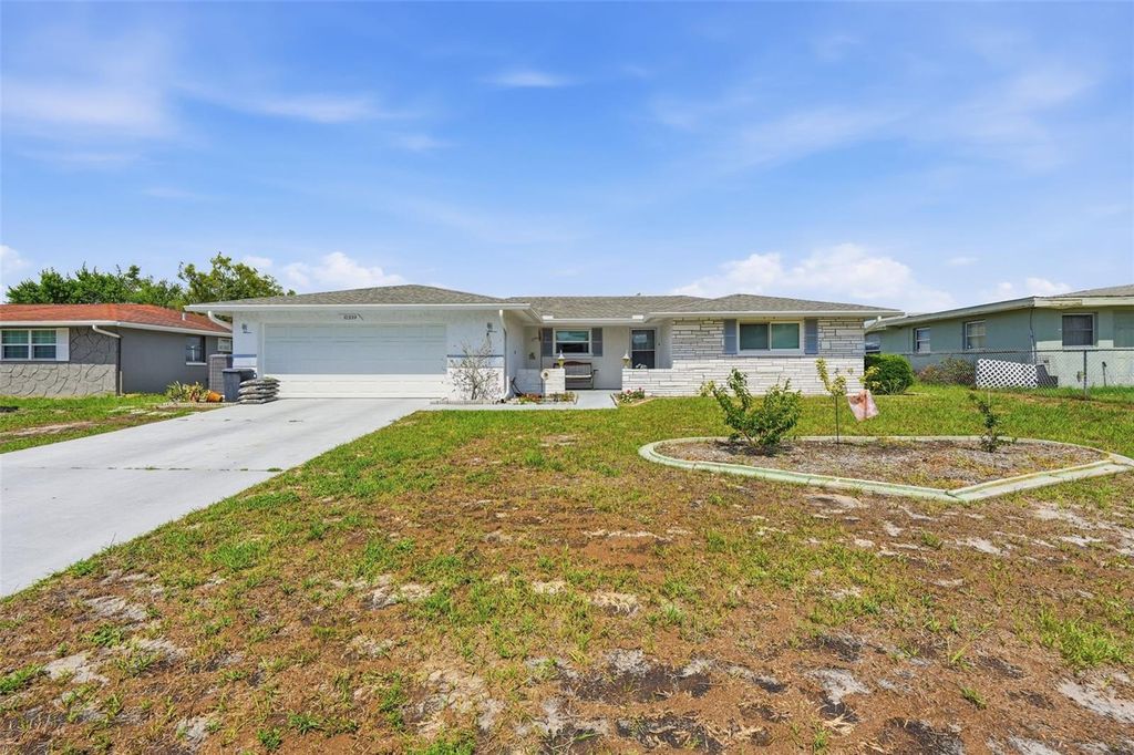 Photo of 10339 Amadeus Drive, Port Richey, FL 34668 (MLS # TB8511563)
