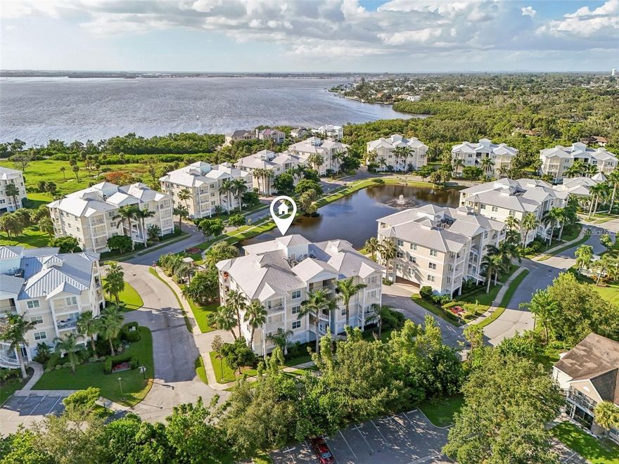 Welcome to fabulous Key West inspired PALMA SOLA BAY CLUB! This 3B/2.5B condo with a total of 2,056 sq. ft living space is situated in a gated community just 4.8 miles to the beaches of Anna Maria Island! Brand new in 2017 with concrete BLOCK construction, Hurricane IMPACT windows and doors, and metal roofing. The Southern exposure location offers much privacy surrounded by lush tropical plants and a larger distance between buildings than most others for added privacy. Boasting upgrades of Blonde wood look tile and Golden Beach Granite Counters throughout, the home is kept in pristine condition and is offered TURN KEY FURNISHED! This condo is located just 2 buildings away from all the wonderful AMENITIES at the PSBC which include a very social clubhouse, GYM, billiard/Library room and two kitchens for large gatherings. Heated pool with ample sun decks and a covered bar and outdoor kitchen to sit with family and friends. Robinson Preserve, DeSoto National Park, Restaurants, Bonefish Grill and shopping Winn Dixie, Home Goods, Ulta, Bath and Body Works and Marshalls are just around the corner! Large dogs, up to 100 pounds are allowed and have a nice, gated dog park for your fur babies to make new friends. Two (2) covered ASSIGNED and designated parking spaces convey with the condo and are close to the ELEVATOR. An additional private storage unit is included for your bikes and beach toys!