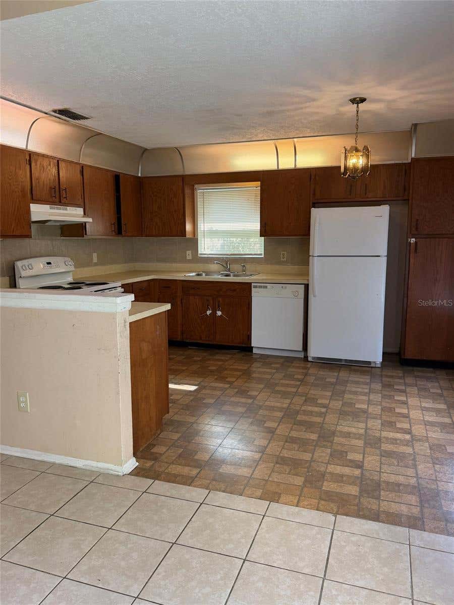 Photo of 6224 Misson Drive, Orlando, FL 32810 (MLS # O6429585)