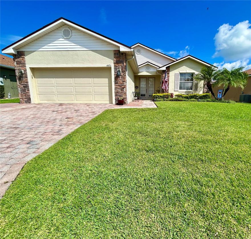 Wonderful OPEN FLOOR PLAN  2 BEDROOM, 2 BATH w. DEN  located in the distinguished 55+community-Beautiful LAKE ASHTON!  
This bright home sits pretty with its large paver driveway, additional paver golf cart pad, extra wide paver walkway nicely landscaped meandering to an elegant double glass door entry.  Upon entering, you will see the continuity of the tile look  luxury vinyl flooring throughout this large, open great room, formal dining and dinette combination.  Entertaining at it finest! Offset from the great room features your spacious open kitchen noting beautiful 42" cabinets with double crown accents, stainless steel appliances, oversized pantry, and wonderful large breakfast bar overlooking the dinette area.  Just beyond the dinette, are (2 )pretty glass French doors that open into a nice size carpeted den and/or home office. Perfect room for a little room to call your own!  (3 ) large sliding glass doors, offering wonderful natural lighting throughout the home, opens into a wonderful 10x20 Florida room upgraded with full sliding glass windows for use all year round!  Prefer a little outdoor living as well? Enjoy this nicely landscaped, private backyard with spacious paver patio sitting area. Grab your chairs, fire up the grill and enjoy all the tranquility this home offers!  Noted upgrades: BRAND NEW ROOF (2023) NEW A/C (2021), upgraded tall vanities in both baths, Master bath features oversized walk-in shower customized with beautiful wood look tile, bronze hand-held shower wand and large corner seat the double car garage was enlarged by an ADDITIONAL 3 FEET ADDED when the home was built - always appreciated for added storage. This home is a MUST TO SEE! Call me to schedule your appointment now- Realtors please be sure to read Realtors notes upon scheduling your appointment!