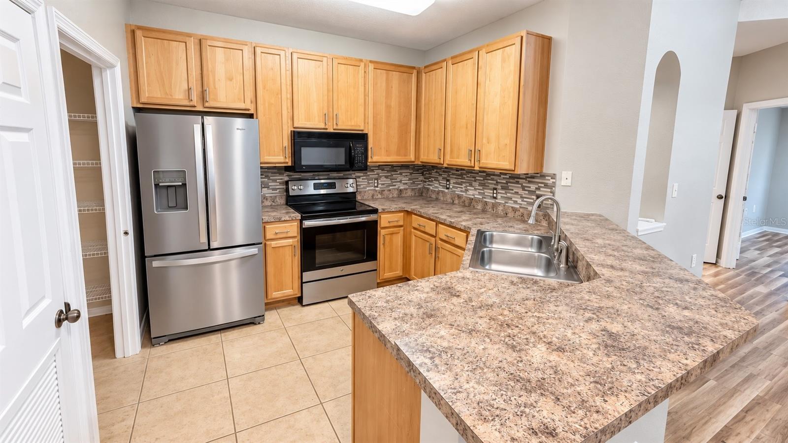 10209 COURTNEY PALMS BOULEVARD 301