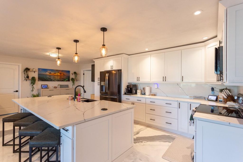 Photo of 6390 2nd Palm Point, St Pete Beach, FL 33706 (MLS # TB8452381)