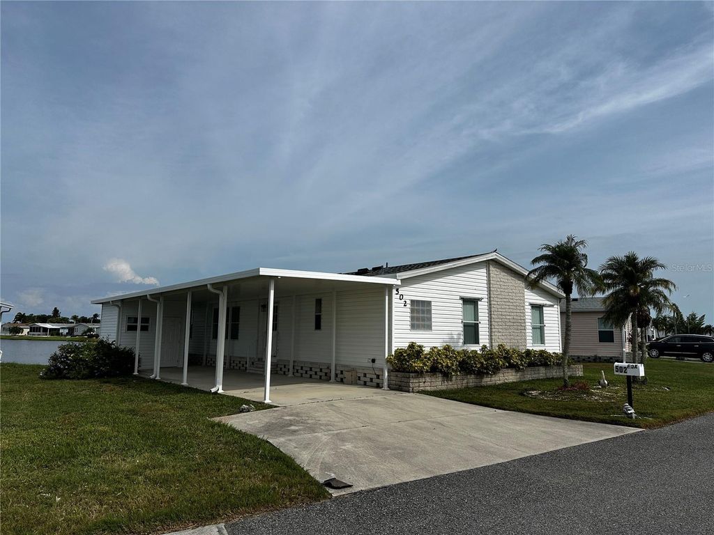 Photo of 502 Amberjack Drive, North Port, FL 34287 (MLS # N6144386)
