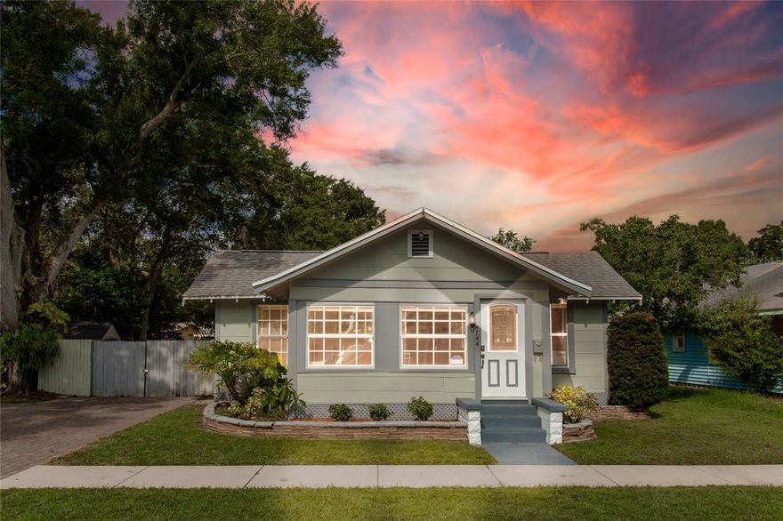 Adorable bungalow in a central St Pete location!  This light and bright 2 bedroom / 2 bath charmer has so much character and a HUGE backyard.  Once you walk through the front door, you’ll immediately notice the natural light that flows through the house.  The sun porch is perfect for a home office area or a reading nook.  The living room is quite spacious.  The primary suite is large enough for a king-sized bed and has an en-suite bath with a walk-in shower.  There is tons of storage and counterspace in the kitchen, plus a gas stove!   A screened porch off the kitchen leads to an enormous back yard with a large deck, imagine the barbeque’s you can host!  There’s plenty of space to park an RV or Boat along with a large parking pad out front.  Recent upgrades include HVAC (2023), refrigerator (2022), additional kitchen cabinets (2022).  Access to Tampa, downtown St Pete and the Gulf Beaches is easy as you’re minutes to I-275.  Located in a NON FLOOD ZONE & NON-EVACUATION ZONE, put this on your list to see!