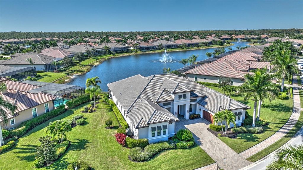 Photo of 6604 Costa Circle, Naples, FL 34113 (MLS # OM715377)