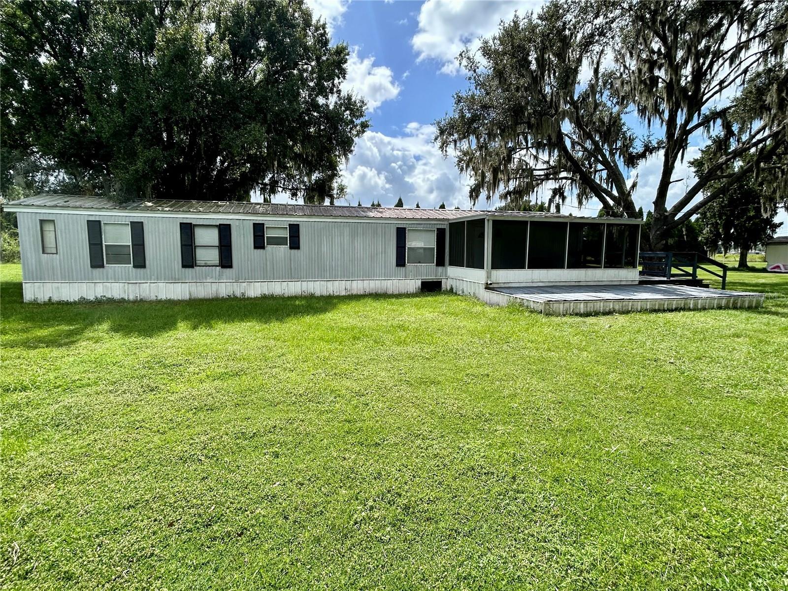 QUIET COUNTRY SETTING at this property of nearly 1 Acre with 2 BD/ 2 BA home, forest views…No Rear Neighbors and Ready to Move Into! This home features stylish vinyl plank flooring throughout, open floor plan and washer dryer hookups. Call today to schedule a viewing!
