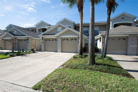 Photo of 9416 Myrtle Creek Lane #703, Orlando, FL 32832 (MLS # O6446465)