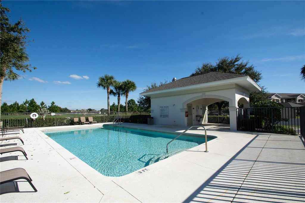 Photo of 9416 Myrtle Creek Lane #703, Orlando, FL 32832 (MLS # O6446465)