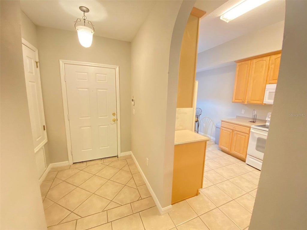 Photo of 9416 Myrtle Creek Lane #703, Orlando, FL 32832 (MLS # O6446465)