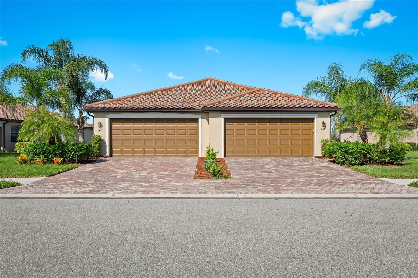 This beautifully designed 2-bed, 2-bath & den villa offers an open concept living experience that's perfect for Modern Living. Situated with a breathtaking lake view, this villa offers a truly tranquil oasis. Enjoy the serenity of waterfront living from the comfort of your TURNKEY FURNISHED home. The panoramic lake view is visible from various vantage points throughout the villa, creating a calming backdrop for daily activities. Step inside and be welcomed by an inviting and spacious open floor plan that seamlessly connects the living and kitchen areas. The design maximizes natural light and encourages a free flow of space and is perfect for entertaining guests or enjoying quality quiet time. The interior of the villa has been FRESHLY PAINTED, ensuring a clean, bright, and engaging atmosphere for you to move in, personalize, and enjoy. The Owner's Retreat is cozy and comfortable all at once and features an en-suite bath and ample closet space. The versatile den can serve as a second bedroom, home office, or reading quarters. The kitchen is equipped with modern stainless steel appliances, granite counters, plenty of cabinet storage, and a breakfast bar too. This fabulous villa also boasts an extended lanai that allows you to immerse yourself in the beauty and splendor of outdoor Florida living. Whether you want to sip your morning coffee, host a barbecue, or simply unwind while taking in the stunning lake view, this spacious outdoor area provides an ideal sanctuary to rest, relax, and have fun. This villa includes a Social Membership to River Strand Country Club, w/ access to pickleball and a tennis center with 8 HAR-TRU lighted tennis courts. There are TWO clubhouses, restaurant, and the main pool has a poolside grill, sand "beach" & resistance pool. You also have use of the 3,500 sq. ft. fitness center with separate aerobics room with 24hr access. This complex is within 1 mile of I-75--a quick commute to St. Pete, Tampa, or Sarasota!