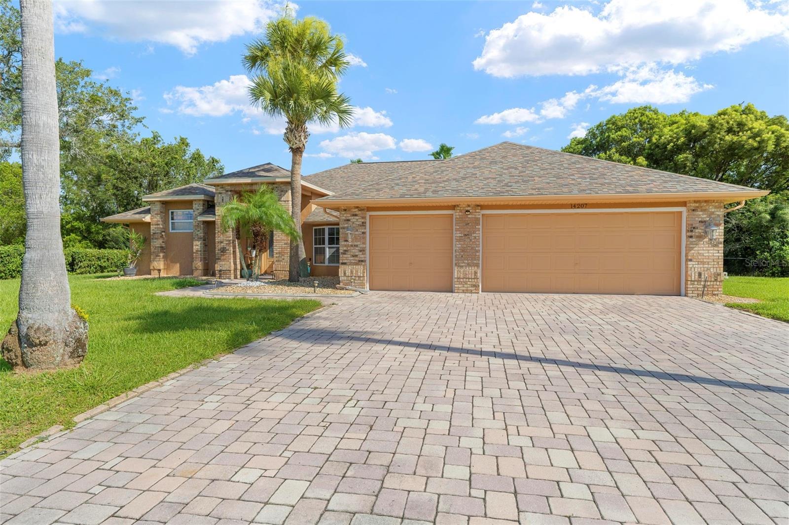 Tucked behind the gates of Pristine Place, 14207 Cornewall Lane offers the perfect blend of space, comfort, and upscale living. This 4-bedroom, 3-bathroom home with a 3-car garage sits on an oversized, fully fenced lot just over half an acre—offering rare privacy and plenty of room to spread out. Inside, you'll find 2,645 square feet of well-designed living space with wood-look laminate and tile flooring throughout, and a newer roof (2021) already in place. The kitchen is both functional and elegant, with granite countertops, rich wood cabinetry, a breakfast bar, electric cooktop, and double wall ovens. The primary suite feels like a private retreat with its own sitting area or home office space, and an en suite bath featuring dual vanities, a soaking tub, and separate shower. Step outside and you’re greeted by a large screened-in pool, a paved patio for lounging or dining, and a backyard that feels like your own private escape. With its generous lot, thoughtful layout, and resort-style feel, this home offers a lifestyle that’s both relaxed and refined. Pristine Place also offers a host of amenities, including a clubhouse, pool, tennis courts, fitness center, and playgrounds—all just minutes from shopping, dining, and the Suncoast Parkway. Repaired Sinkhole.