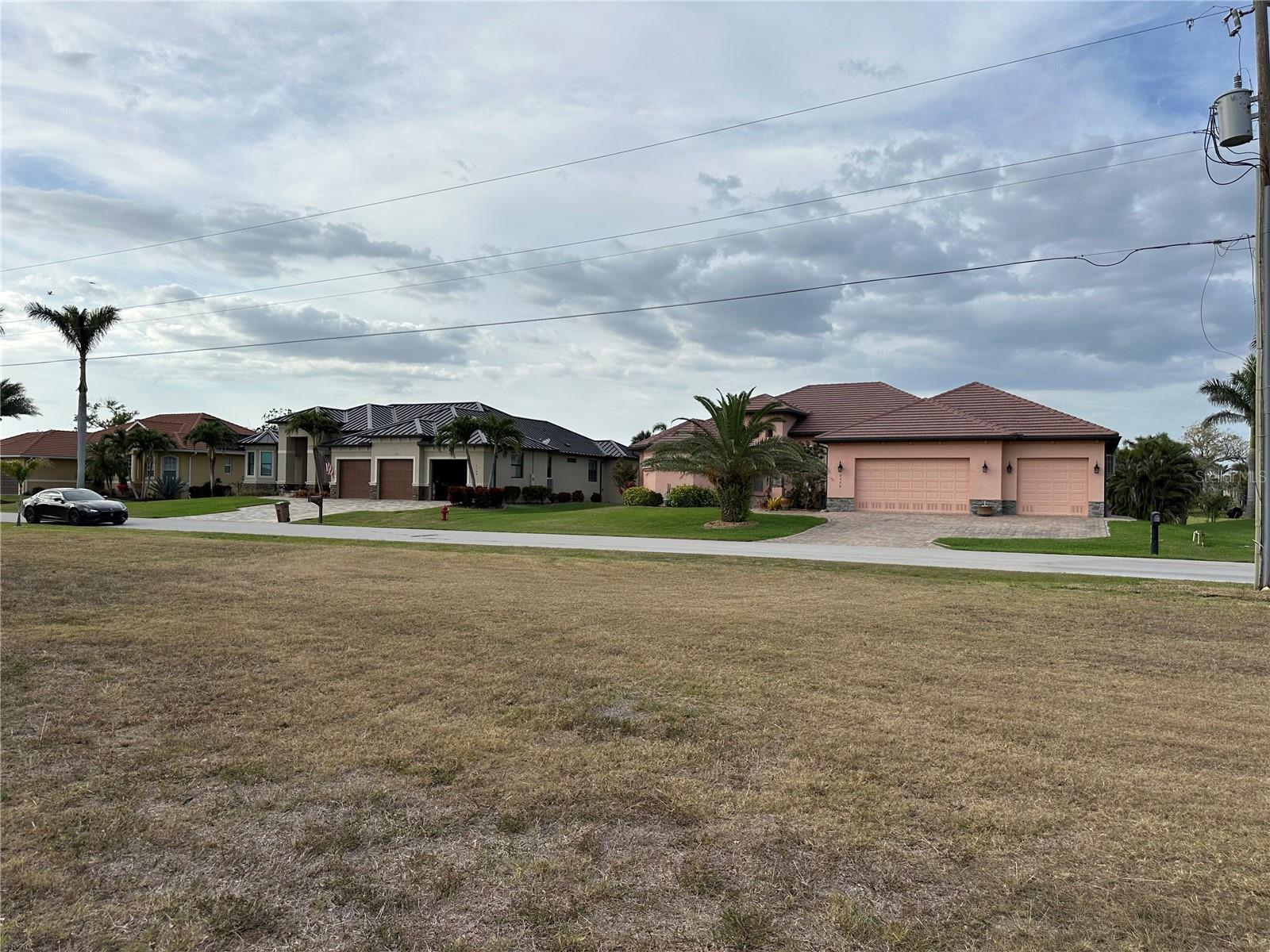 Over half an acre with southern exposure on the St. Andrews South Golf Course—zoned GM-15 Multi-Family! Build your dream Florida estate or develop up to 8 units—whether you’re envisioning luxury villas or a private retreat. This rare double lot is ideally located in the heart of Punta Gorda Isles, surrounded by championship golf, waterfront dining, Fishermen’s Village, Charlotte Harbor, and world-class boating and fishing. St. Andrews South Golf Club memberships were available at the time of listing—an added bonus for avid golfers. Enjoy easy access to pickleball, biking trails, shopping, and more.
An unbeatable lifestyle opportunity—secure your slice of paradise today!