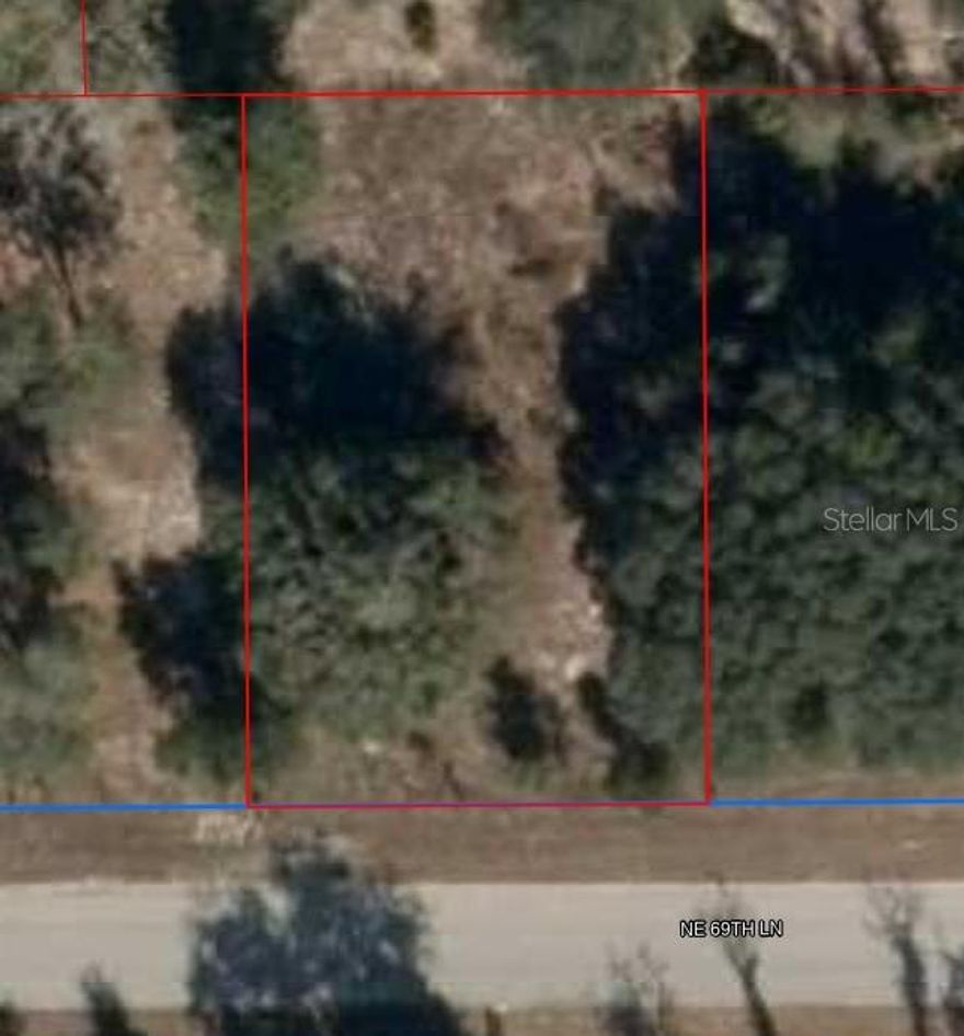 Great lot close to HWY 27, on a paved road. Ready for new home or manufactured home.